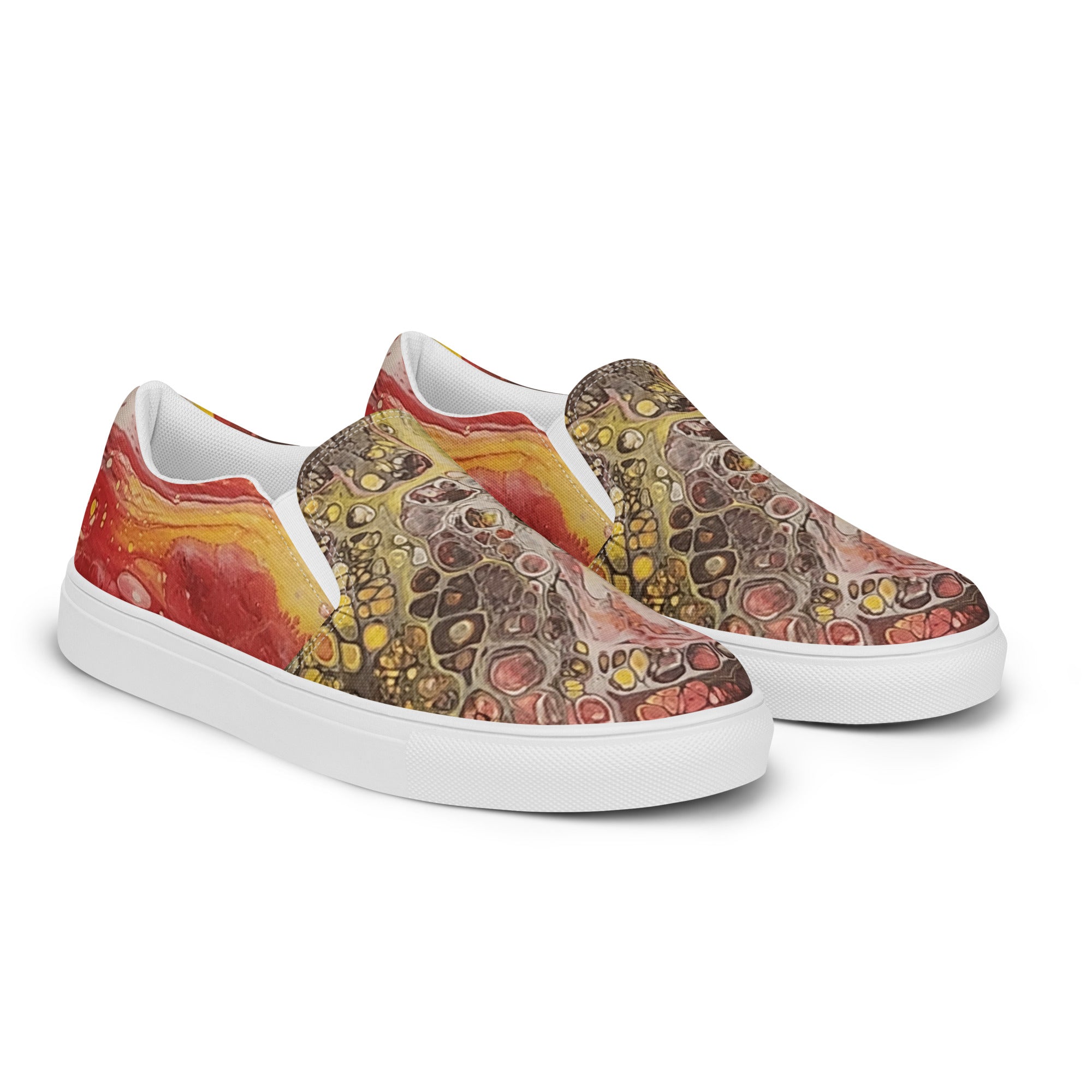 Colorful slip-on sneakers with a patterned design on a white background