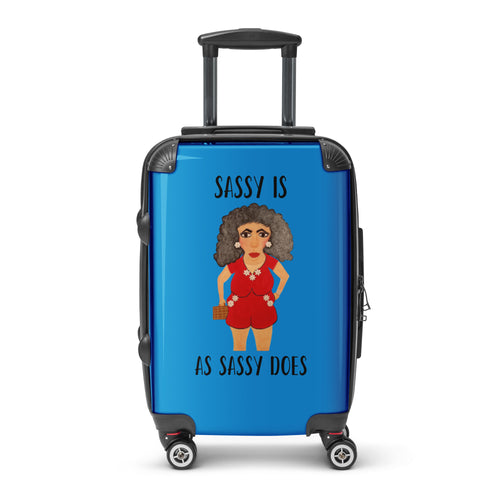 blue suitcase with whimsical cartoon woman