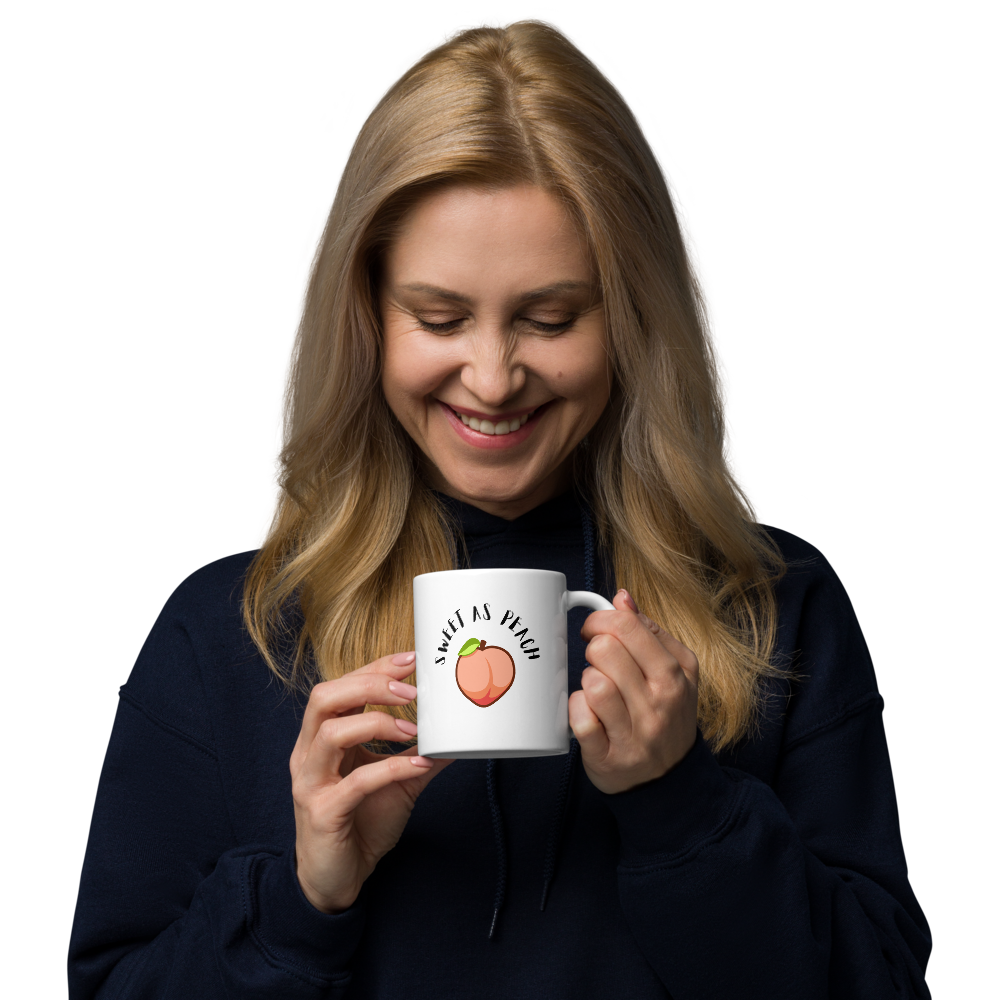 Woman holding a mug with 'You are feen-tastic' text on a white background