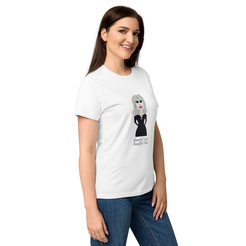woman showing side view of a t-shirt with a cartoon character and a catchy phrase