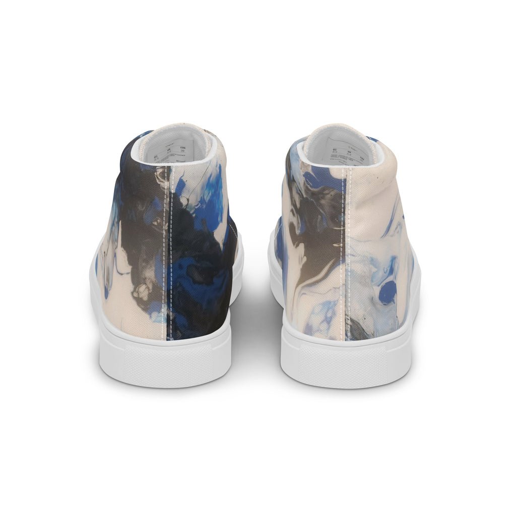Pair of high-top sneakers with abstract design on a white background