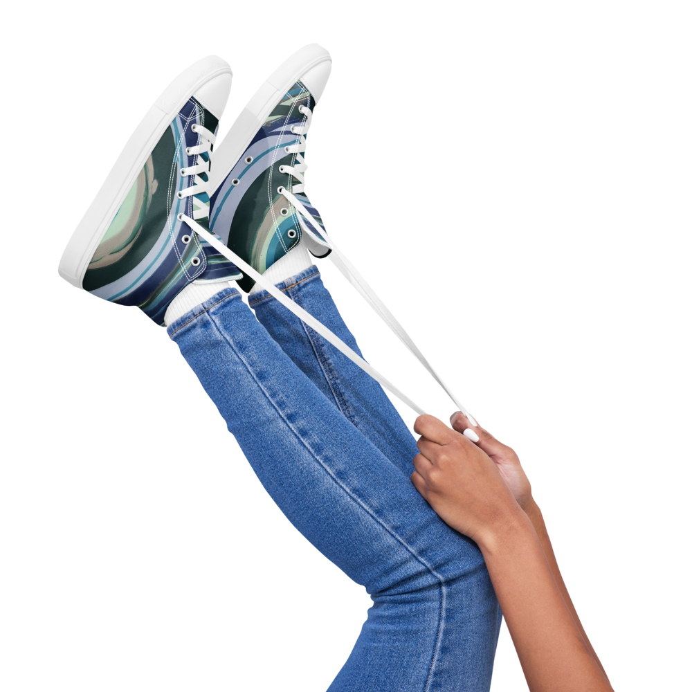 Blue jeans and white sneakers with a hand holding the foot on a transparent background