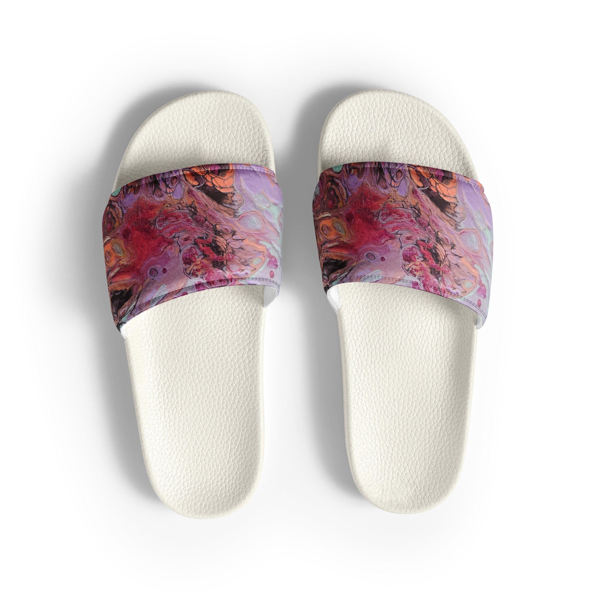 Pair of white slides with colorful band on a white background