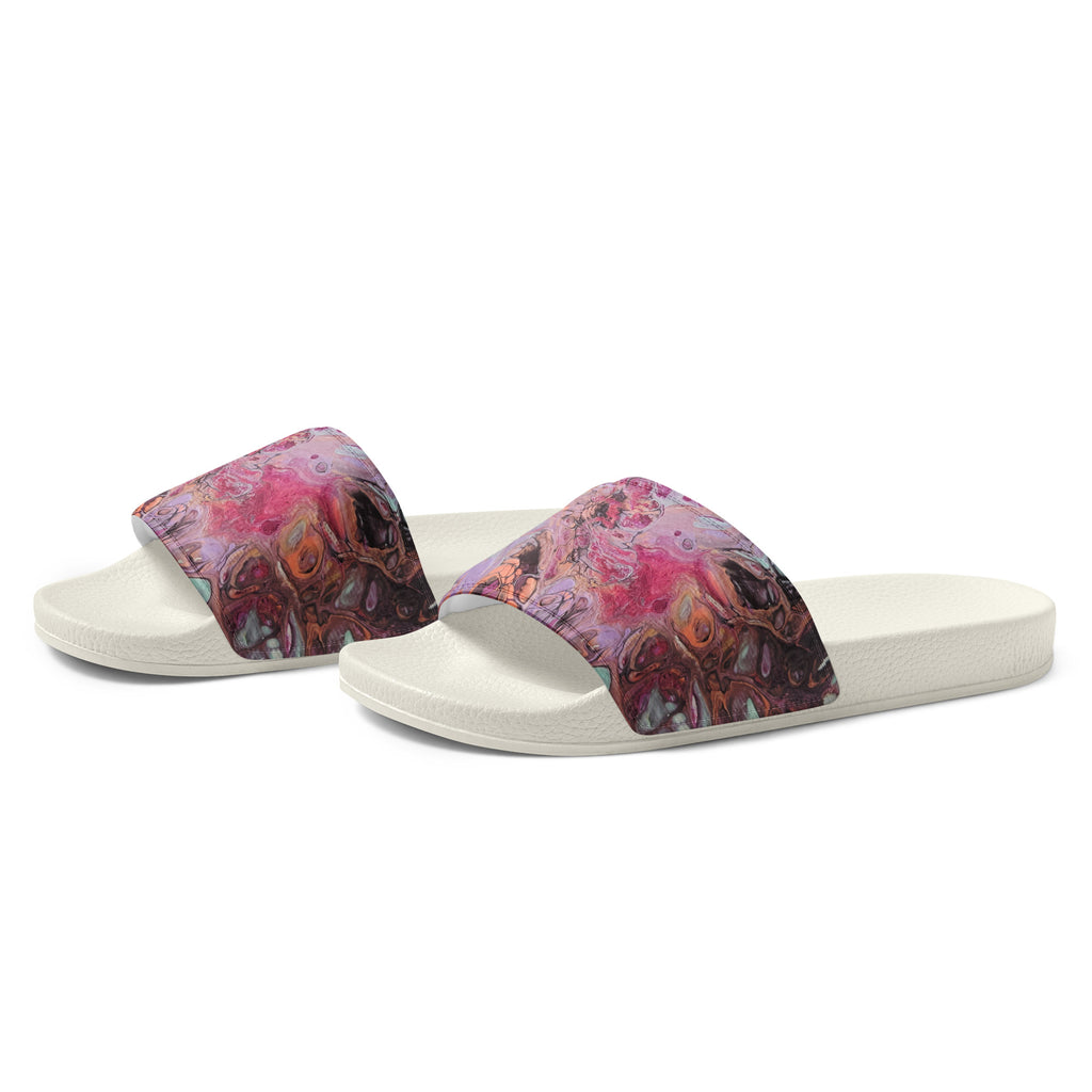 Pair of white slides with colorful band on a white background