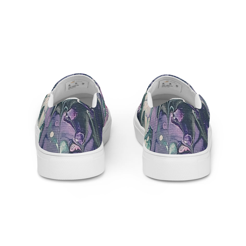 Pair of floral-patterned sneakers on a white background