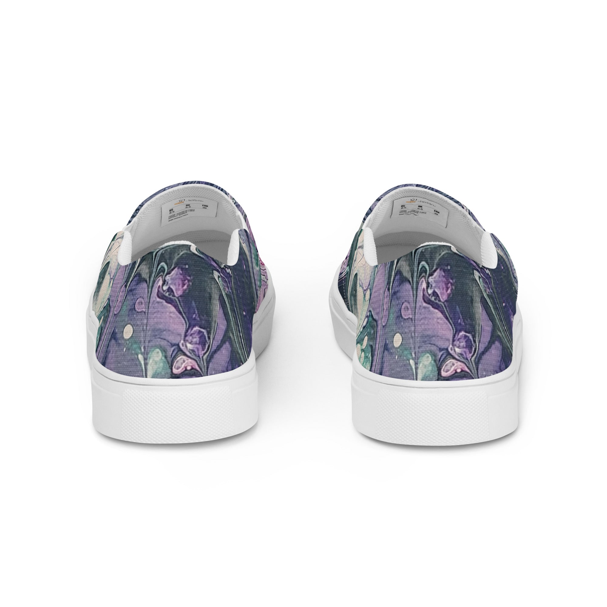 Pair of floral-patterned sneakers on a white background