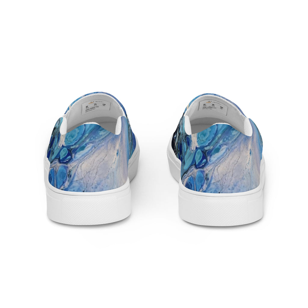 Blue abstract-patterned sneakers on a white background