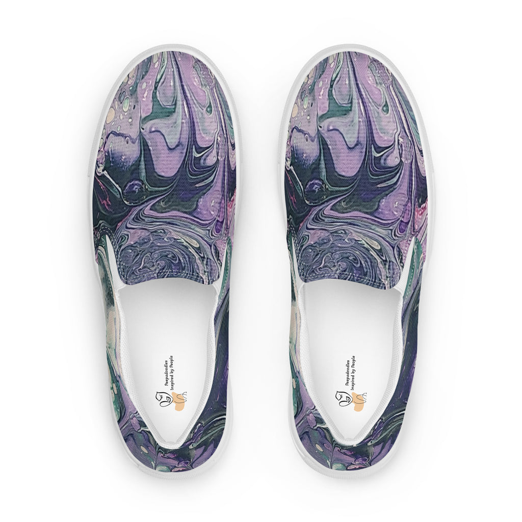 Pair of slip-on shoes with marbled purple and green design on a white background
