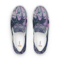 Pair of slip-on shoes with marbled purple and green design on a white background