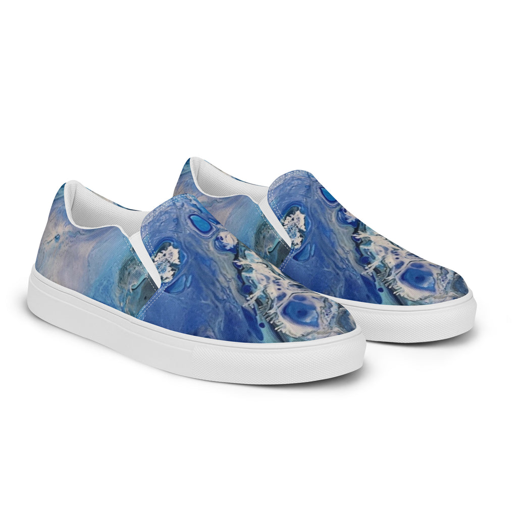 Blue abstract-patterned sneakers on a white background